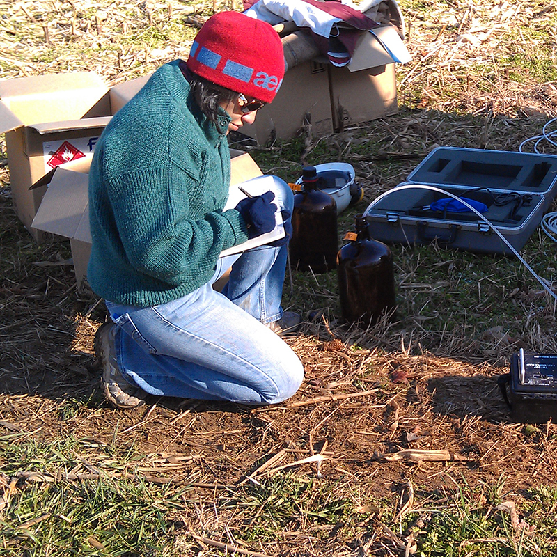 Graduate student working in the field