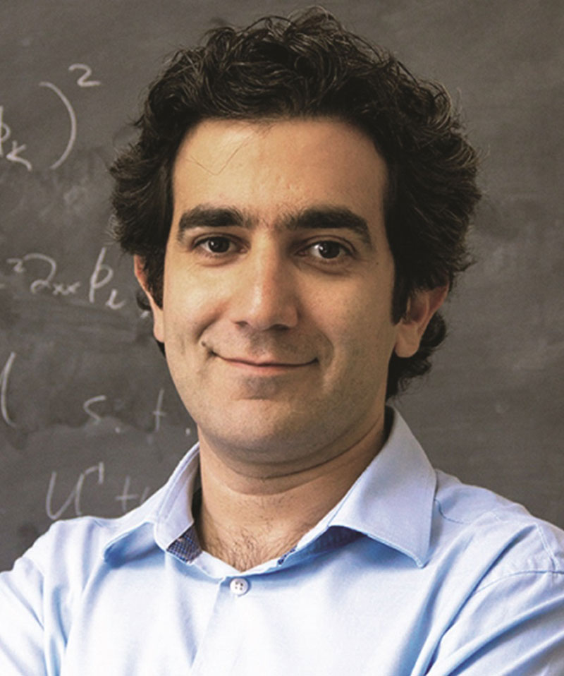 Headshot of Mohammad Hafezi wearing a blue button down shirt