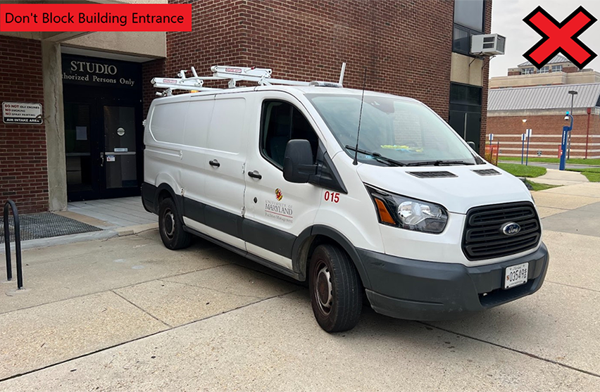 Improperly parked vehicle blocking building entrance