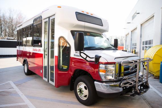 small transit bus faced to the side